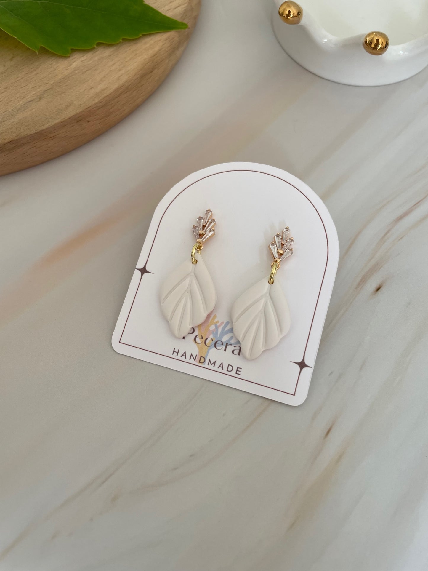 Aros Élodie Brillos