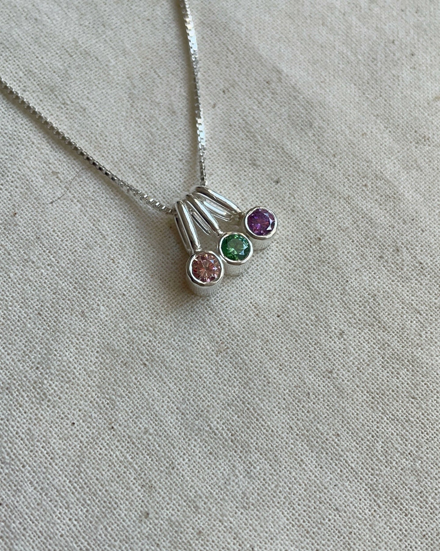 Mini Charm Punto de Luz de plata con circón