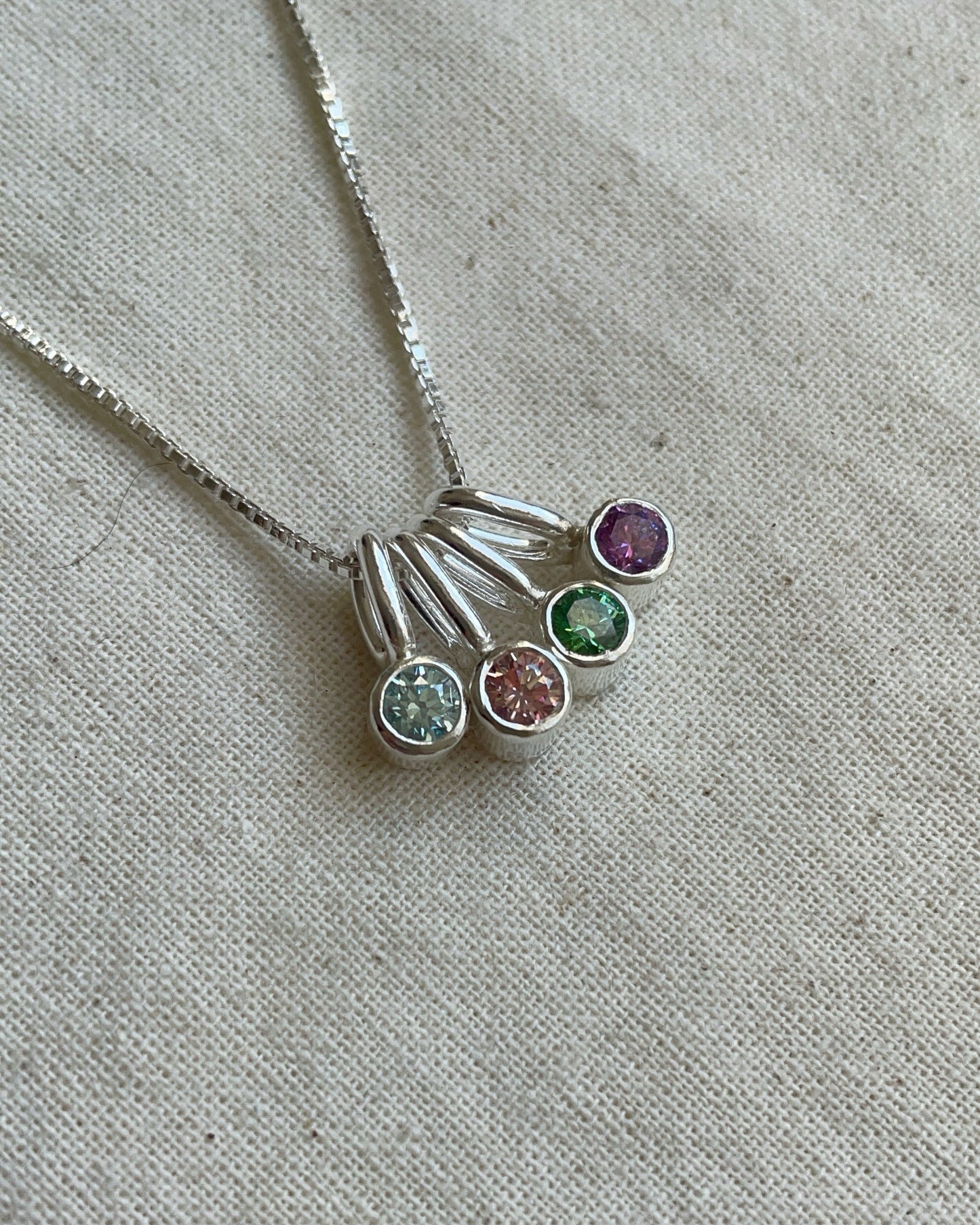 Mini Charm Punto de Luz de plata con circón